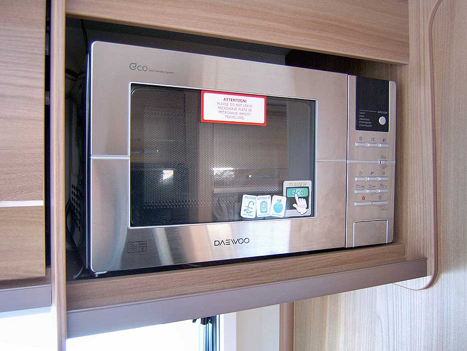 The Daewoo Microwave provides additional cooking and food heating options.